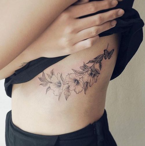 bali tattoo placement rib